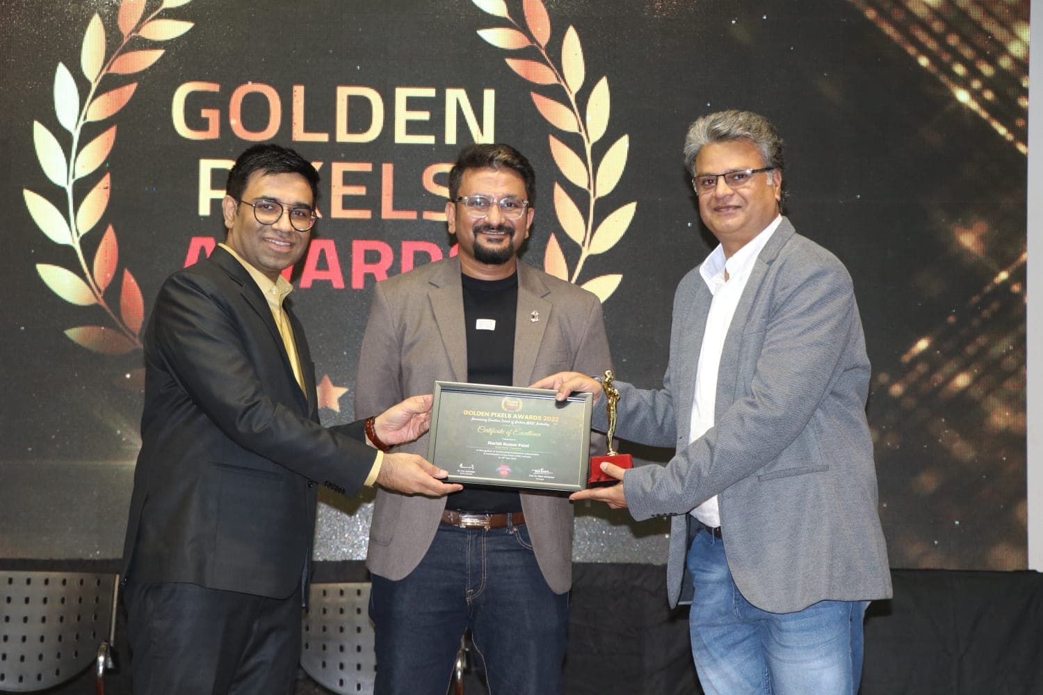 Certificate of Excellence and trophy presented on stage at the Golden Pixels Awards 2022