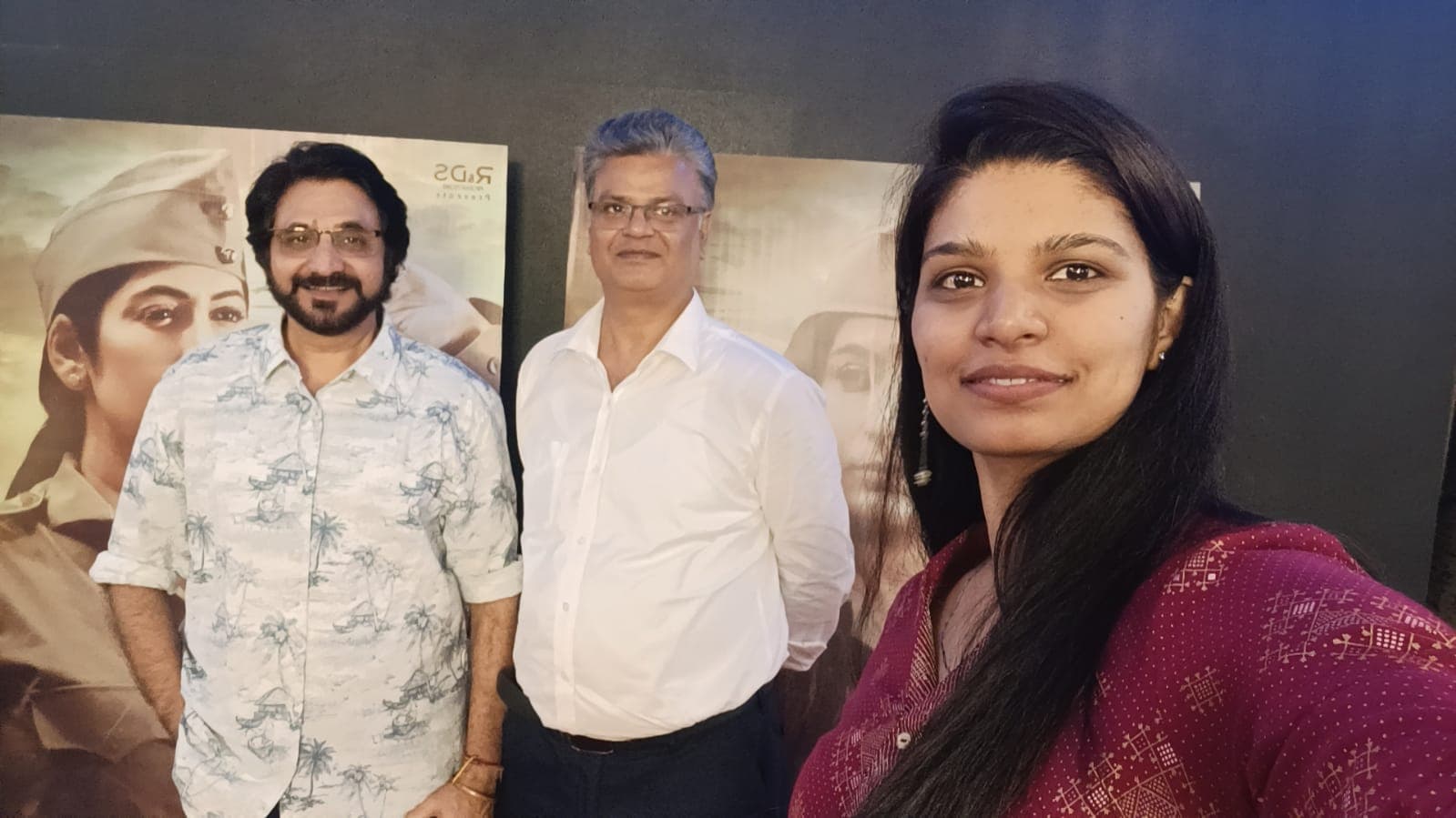 Guests photographed in front of the Neera Arya poster wall at the launch
